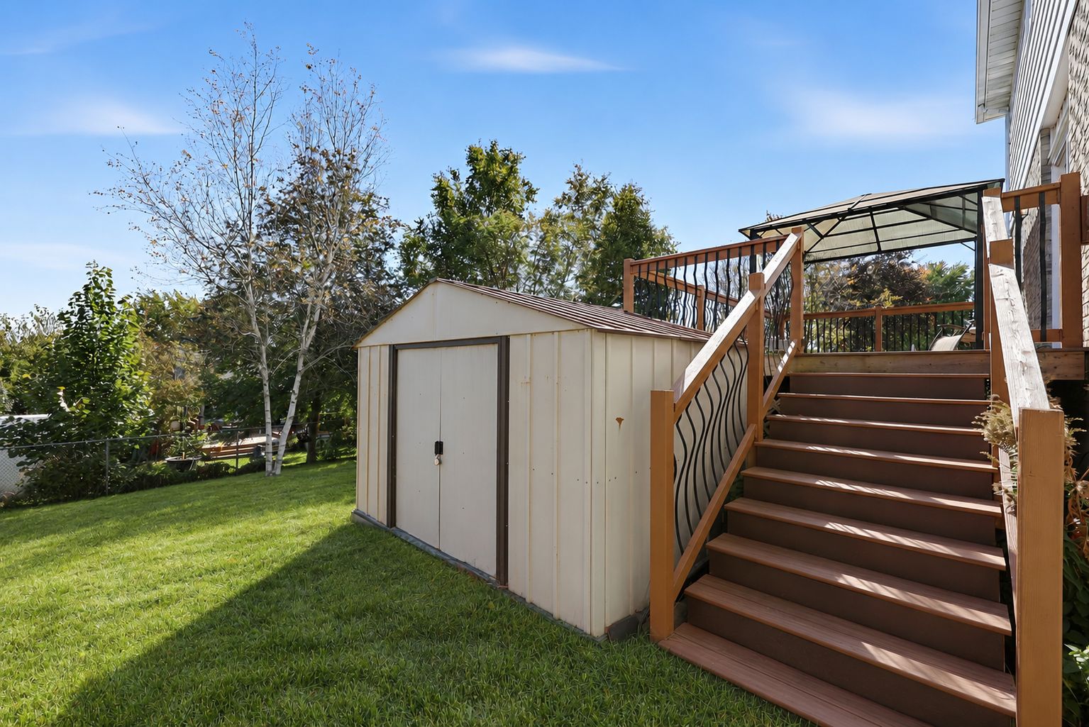 Neat backyard lawn by shed-4